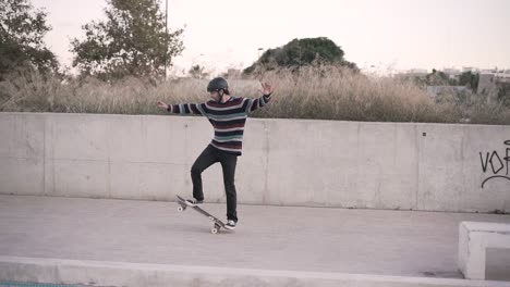 skateboarder performing tricks on a longboard