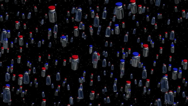 Blue and red vaccine bottles are falling on a black background.