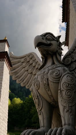 stone griffin sculpture at a tibetan monastery