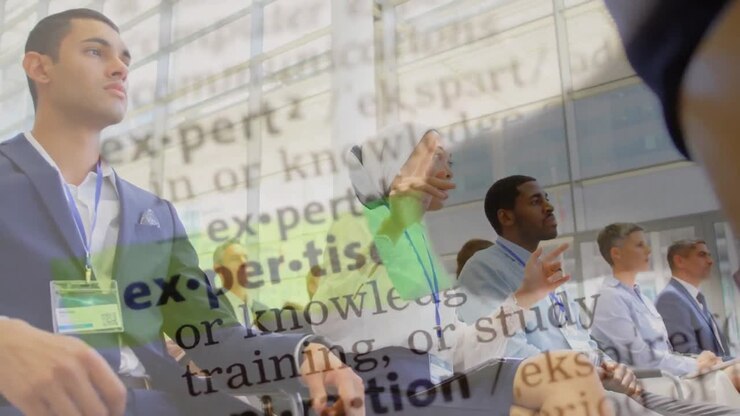 Animation of texts over diverse business people having meeting at office