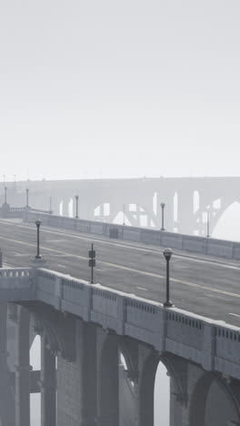 a concrete bridge in the fog