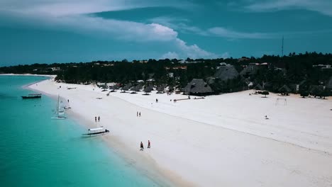 great aerial flight fly backwards slowly rise up panorama over view drone shot of
paradise white sand beach on zanzibar, africa 2019