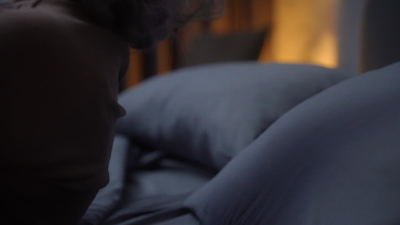 Woman trying to sleep