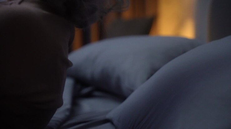 Woman trying to sleep