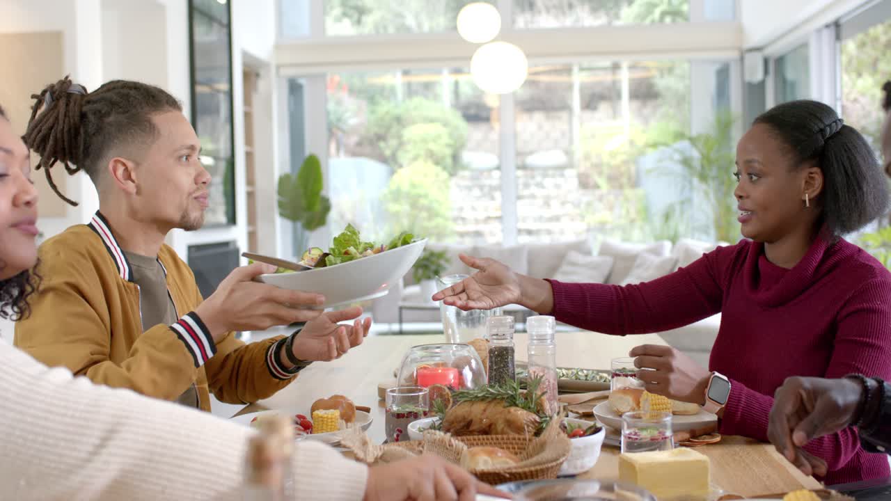 People having dinner together