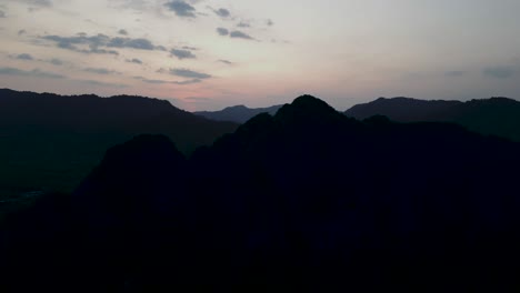 silhouetted mountains at twilight