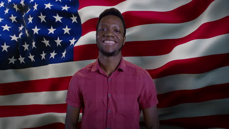 happy man in front of american flag
