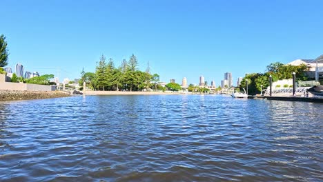 boat cruising through gold coast's scenic canals