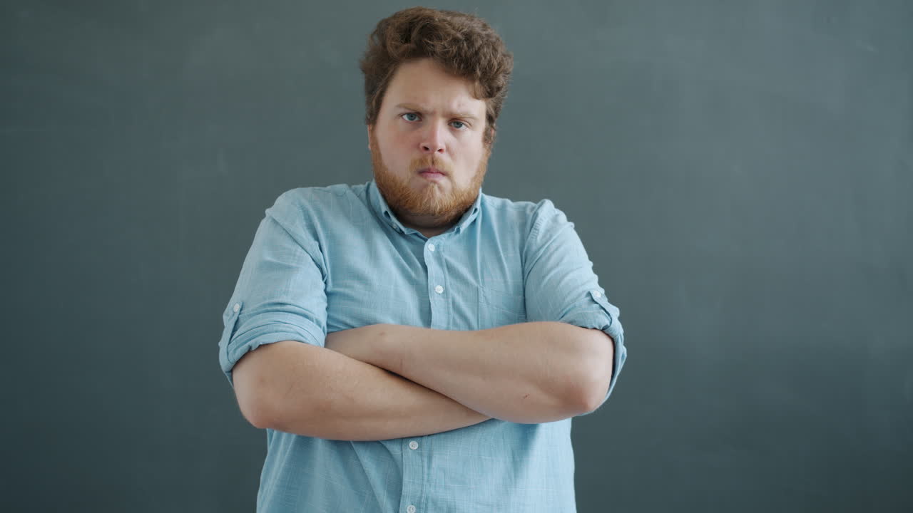 Angry Man with Arms Crossed