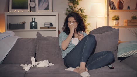 woman crying on the sofa