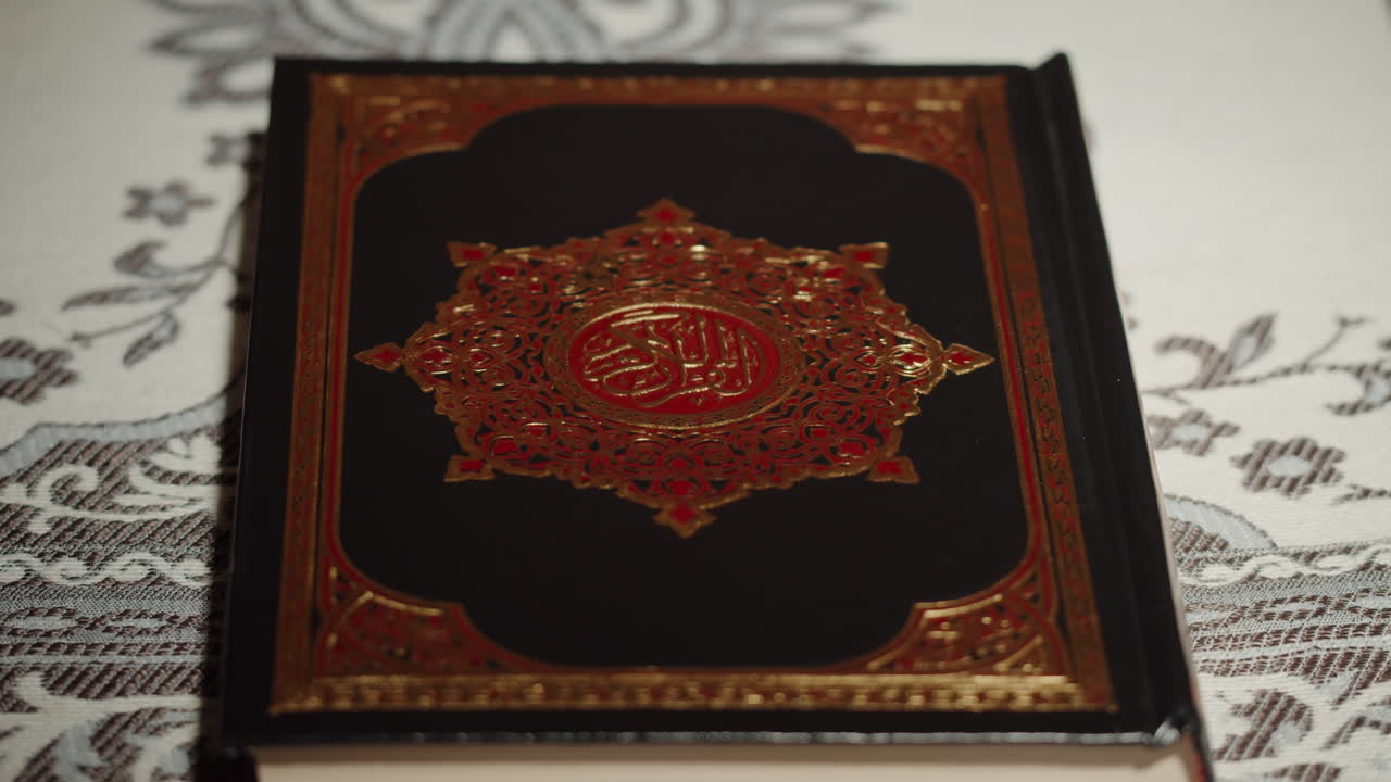 Quran book close-up, praying, islamic religion. Religious holiday Ramadan, holy month. Worship, making traditional prayer to God
