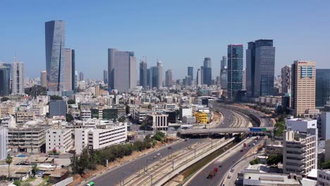 tel aviv city skyline mediterranean sea and traffic- aerial footage