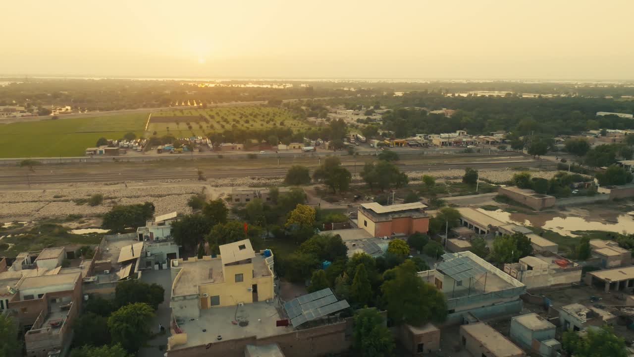 Sunset over a rural village in Pakistan, a region affected by natural disasters