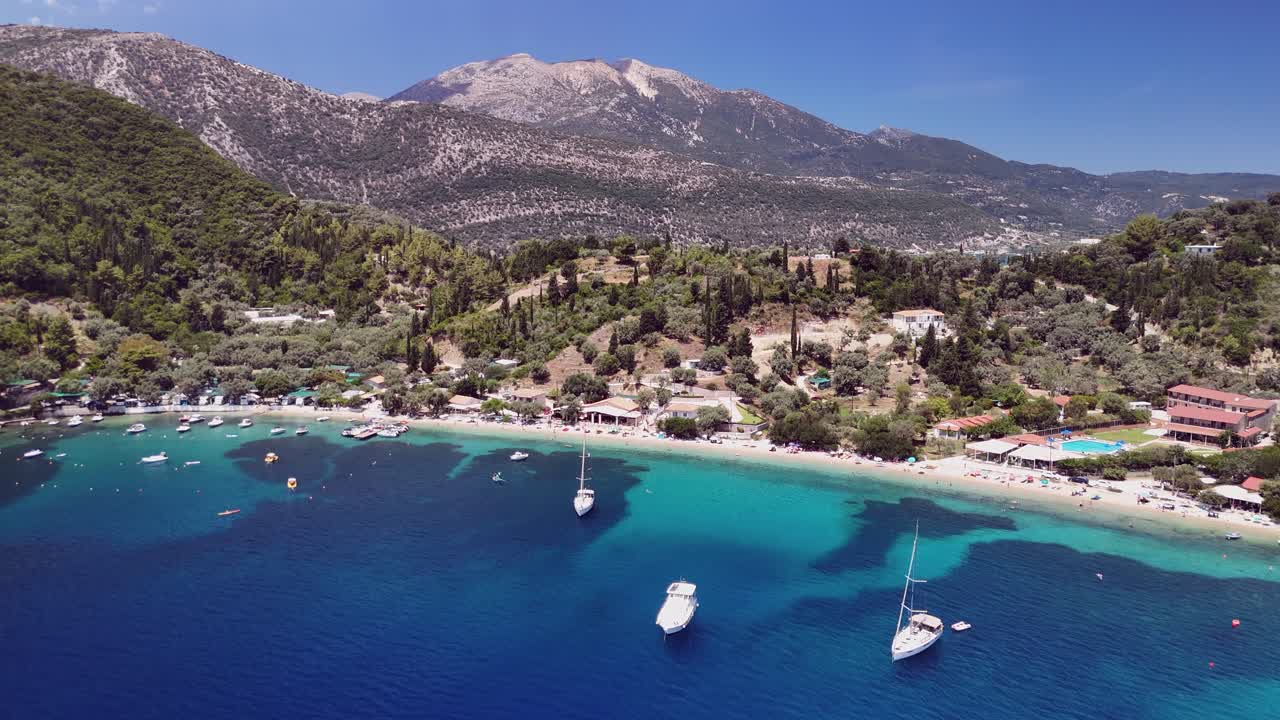 Aerial approaches shallow sand Desimi Beach on Lefkada Island, Greece