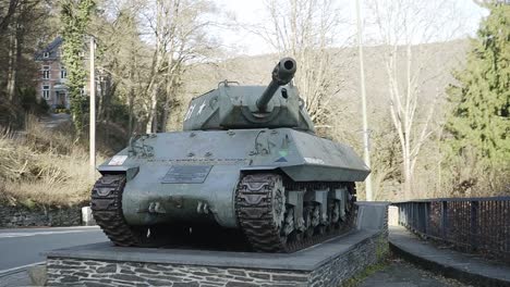 world war 2 tank standing on a road in la roche, in belgium