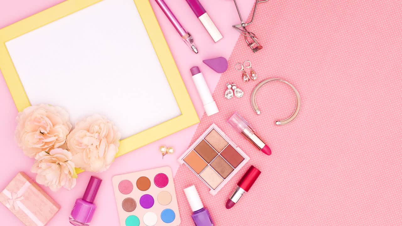 Yellow frame for text and make up products move on left side on pink theme. Stop motion