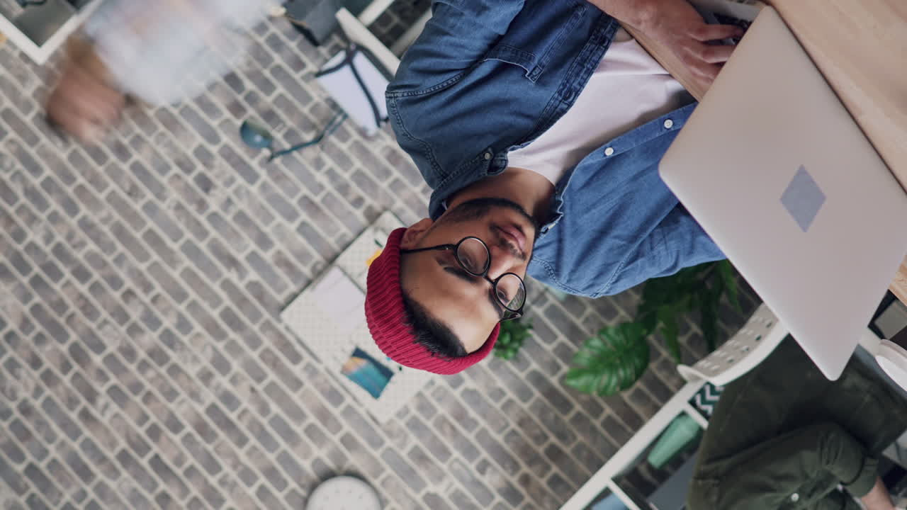 Coworking space with people working on laptops