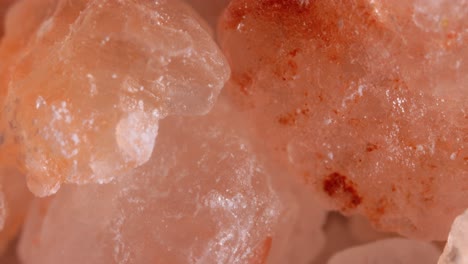 himalayan pink salt super macro close up. due mainly to marketing costs, pink himalayan salt is up to twenty times more expensive than table or sea salt.