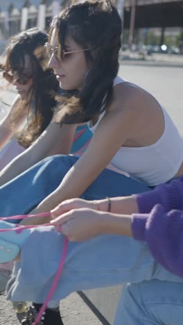young women relaxing outdoors on a sunny day