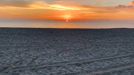 timelapse of a sunrise on south beach, miami beach, florida