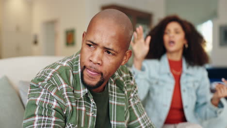 couple arguing in a living room