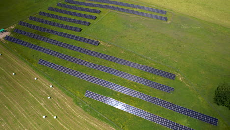 Aerial-View-Of-Solar-Panels-In-The-Country-Field-In-Summer