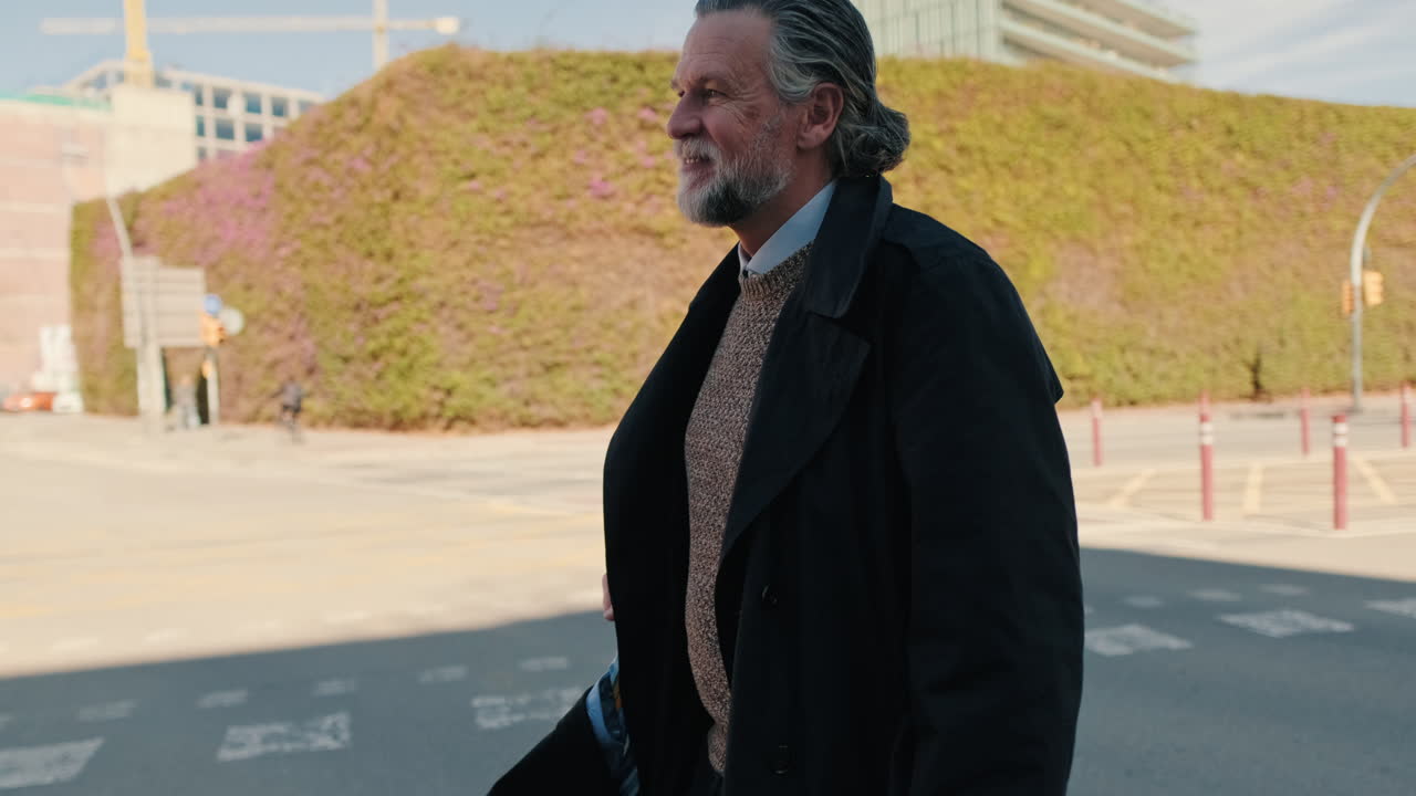 Smiling Businessman Walking in the City