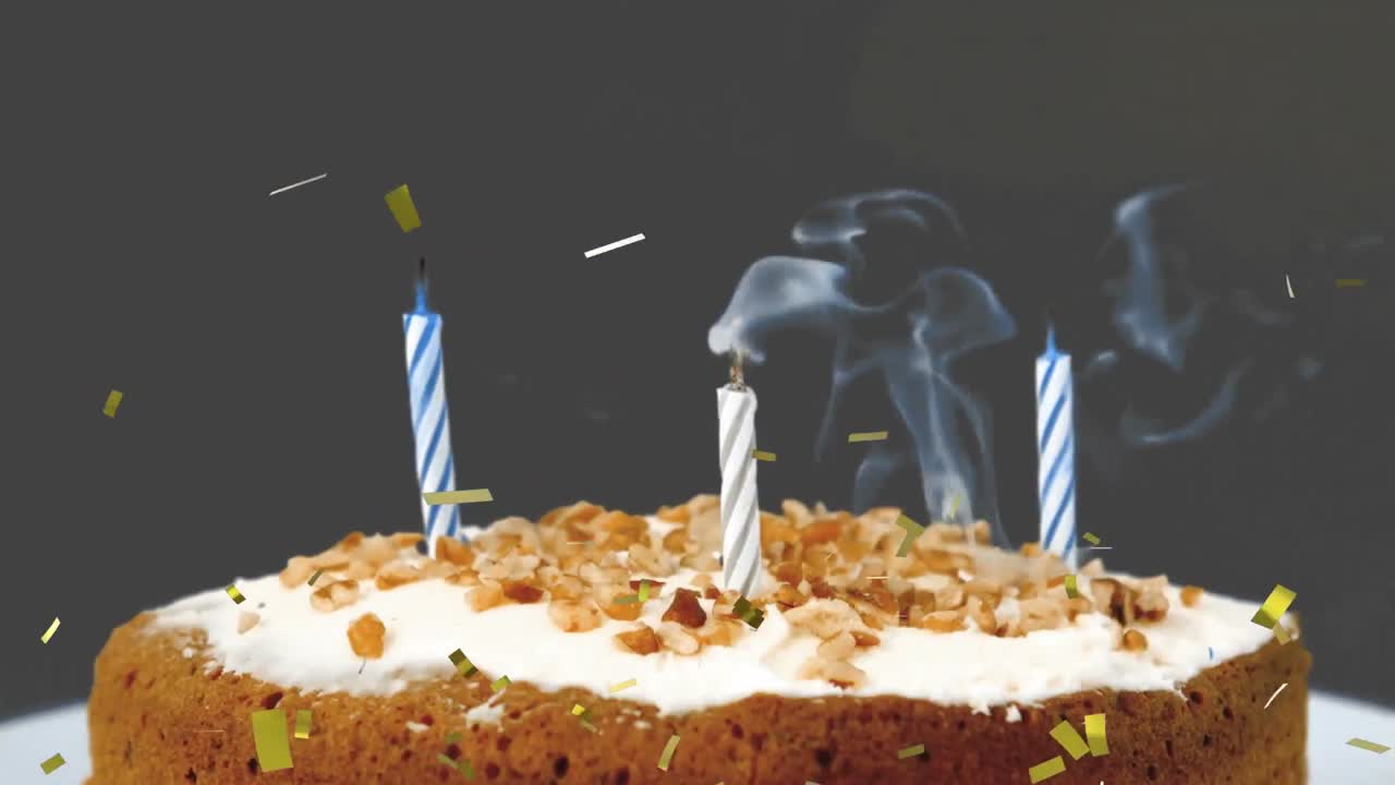 animación de confeti de oro cayendo sobre el pastel de cumpleaños con velas