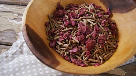 Cereal-bran-stick-and-dried-fruits-in-a-bowl-4k