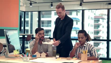 creative business people group having conversation at office desk in workplace.