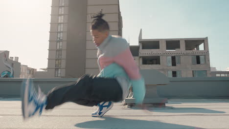 dancing-man-breakdancing-on-rooftop-in-city-hip-hop-dancer-practicing-dance-routine-with-hand-stand-performing-freestyle-moves-in-city