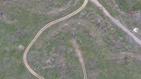 Circle-Top-Down-View-of-a-Car-Drone-Footage