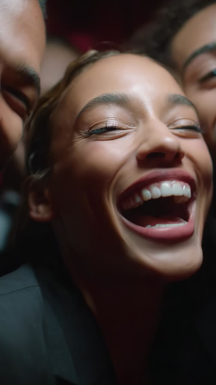 A joyful moment captured, showcasing genuine happiness and camaraderie among friends, highlighted by vibrant smiles and a warm, inviting atmosphere