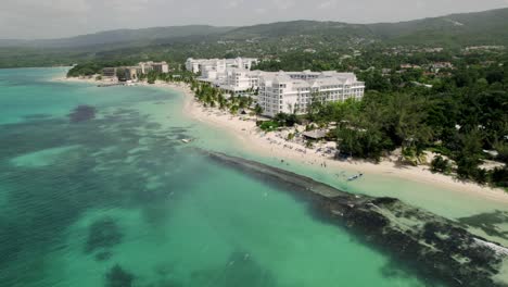 Panning-left-Amazing-drone-tropical-shot-of-blue-sky-turquoise-water-in-st