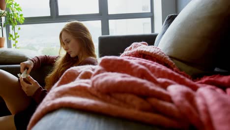 woman reading a book in living room 4k