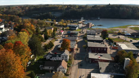 beautiful aerial view of lisbon falls downtown, with the androscoggin river in the background