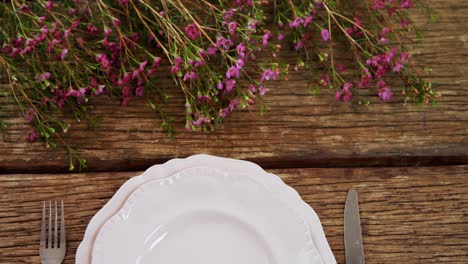 various cutlery on wooden table 4k