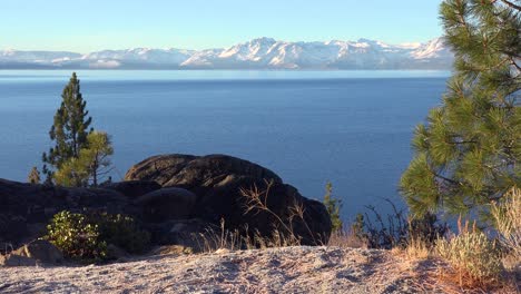 Beautiful-Establishing-Shot-Of-Lake-Tahoe,-California,-Nevada,-Sierras-In-Winter-With-Snow