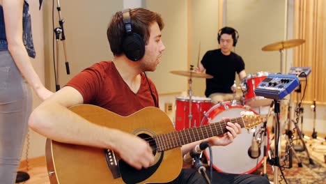 music band performing in studio