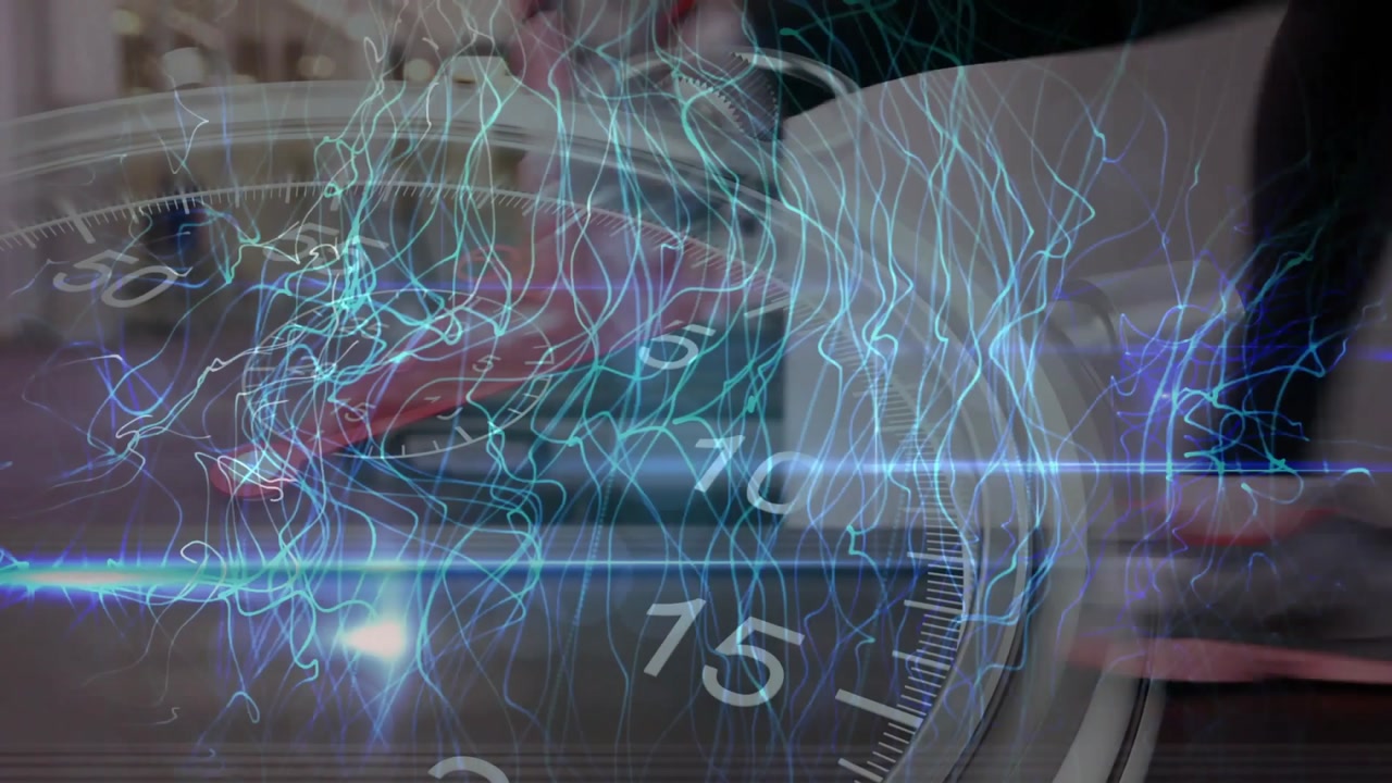 Gloved hand entering and twisting red control knob clockwise, energizing gauge and powering device