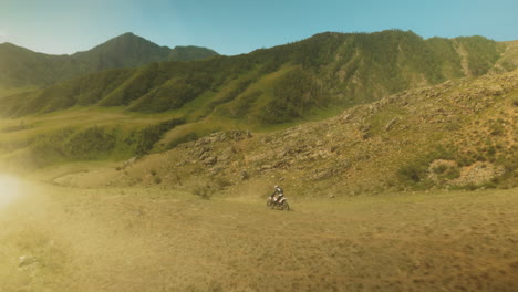 adrenaline-fueled race of motorcycles. motorcyclists push limits battling terrain and each other for coveted victory. steep inclines of mountain