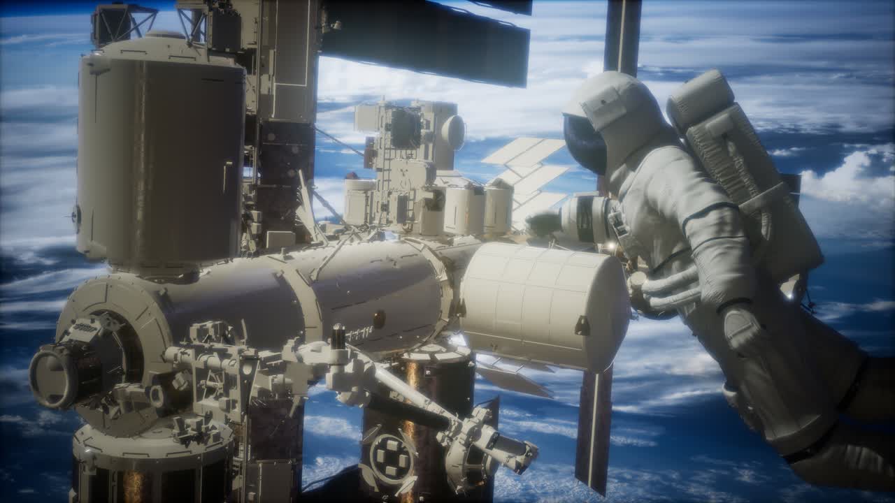 International Space Station and astronaut in outer space over the planet Earth