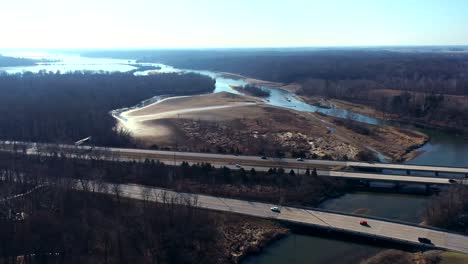 highway stretch crossing river and panoramic view of surrounding landscape, indianapolis