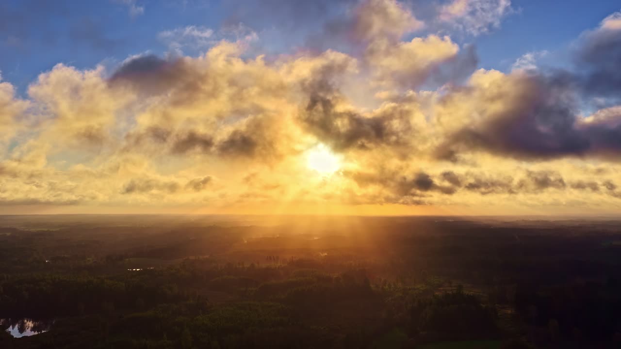 Beautiful time-lapse of sunrise over cloudy sky, showcasing nature's glory