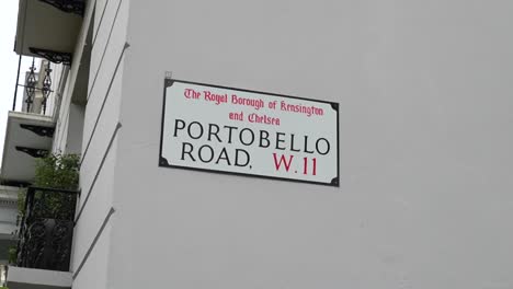 street sign of portobello road in the royal borough of kensington and chelsea, london w11