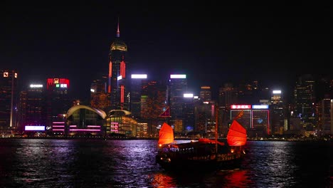 colorful lights illuminate hong kong's iconic skyline
