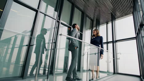 business professionals conversing in a modern office