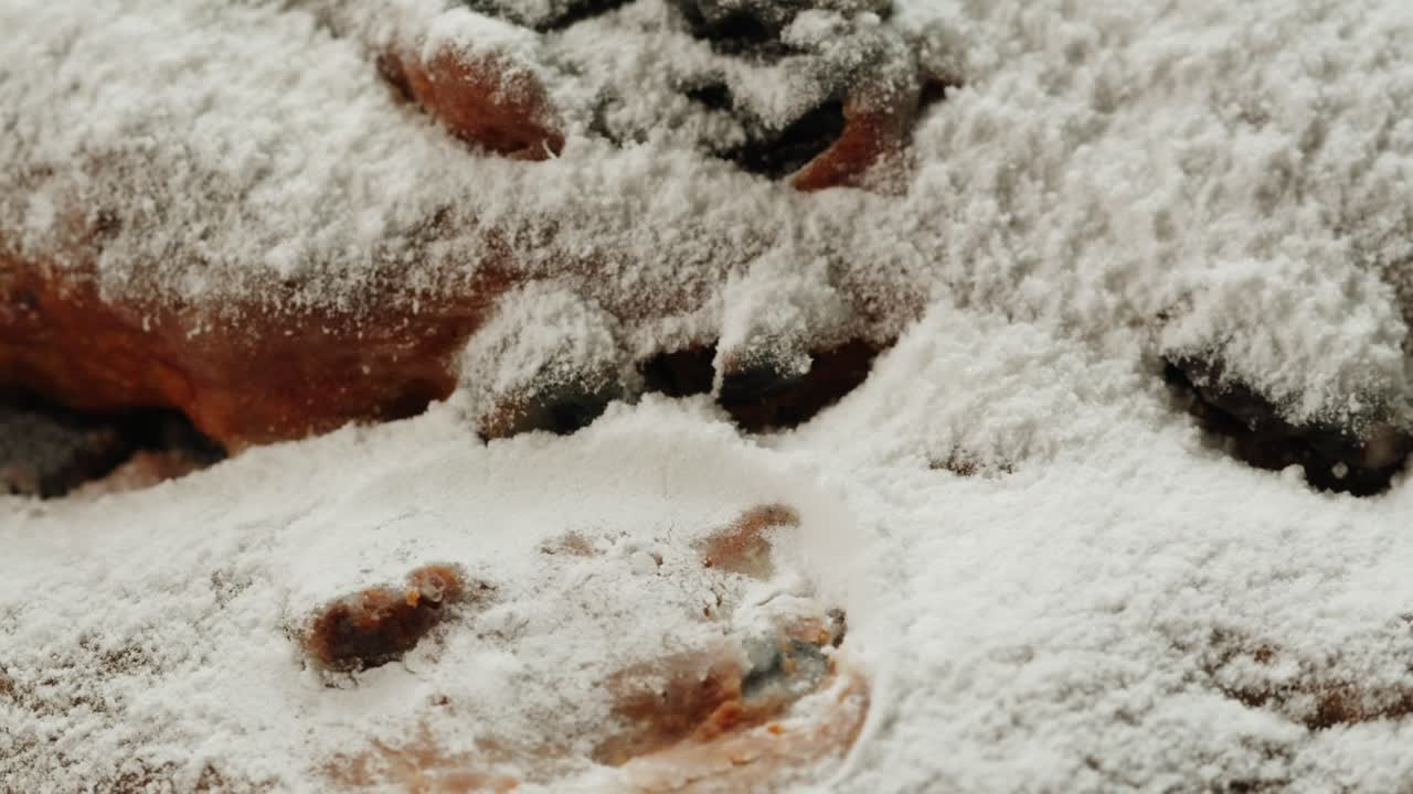 Close up of a sugared Christmas Stollen