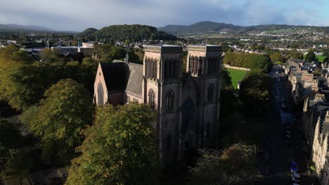 aerial drone shot of st andrews cathedral steeples in inverness, scotland in the highlands