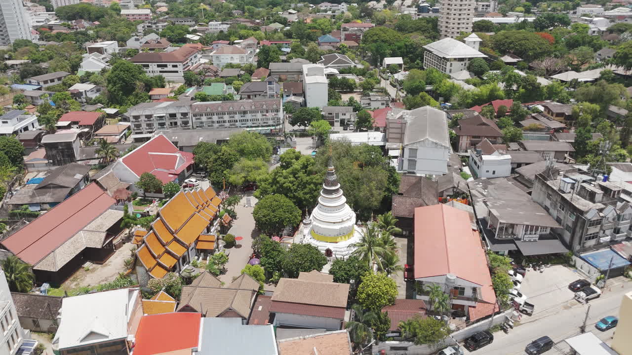 Ancient Wat Ket Karam Buddhist Temple Along Ping River In Chiang Mai, Thailand. Aerial Drone Shot